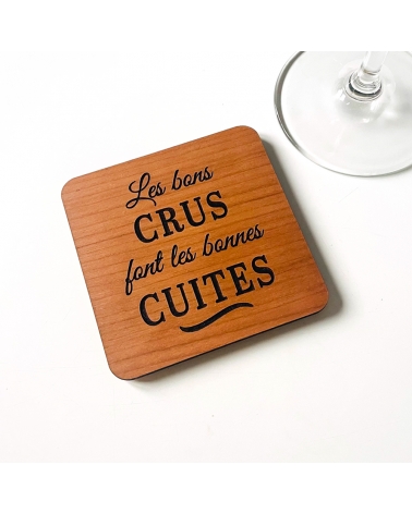 Dessous de verre en bois gravé